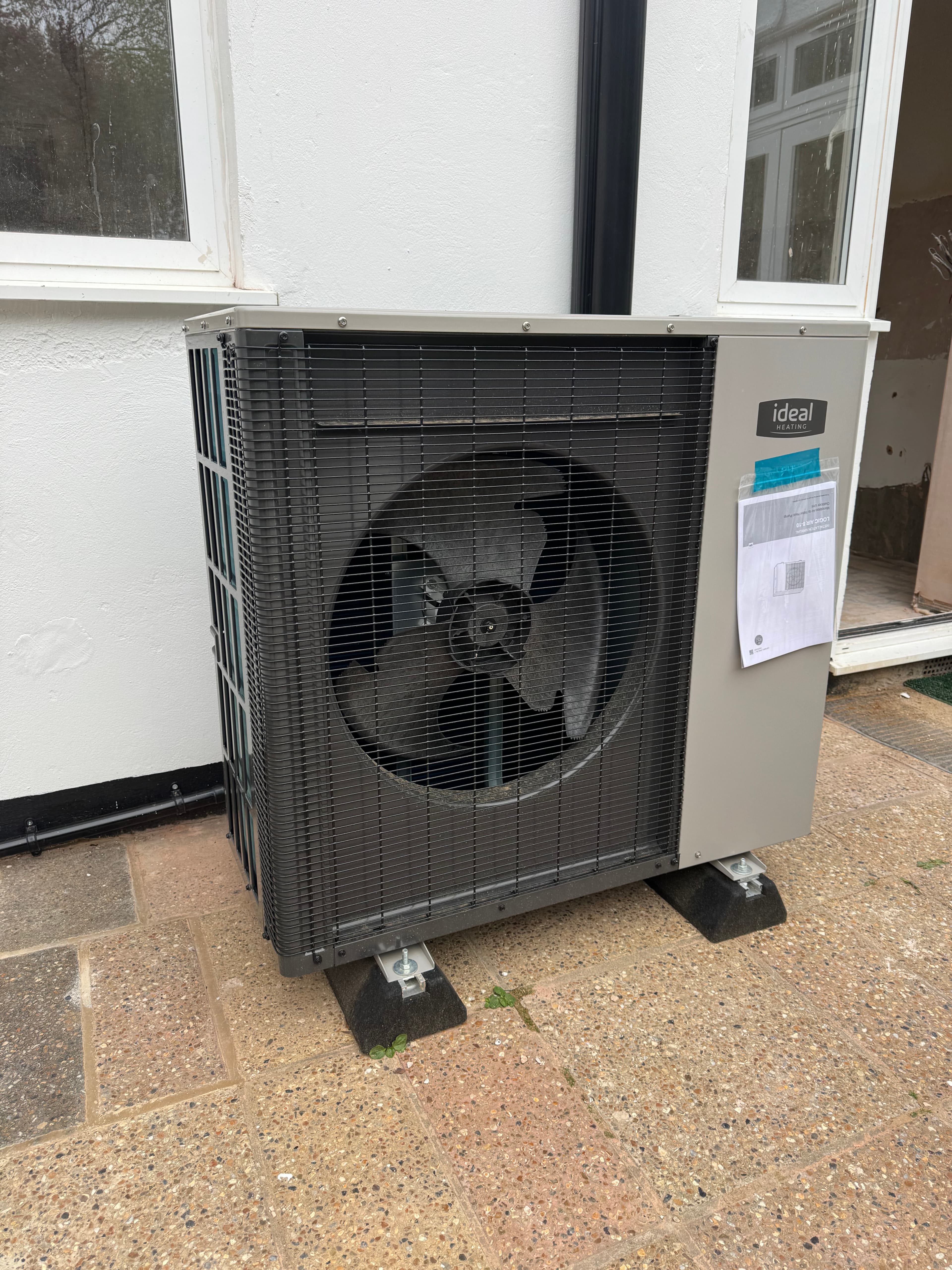 Front view of heat pump fan grille