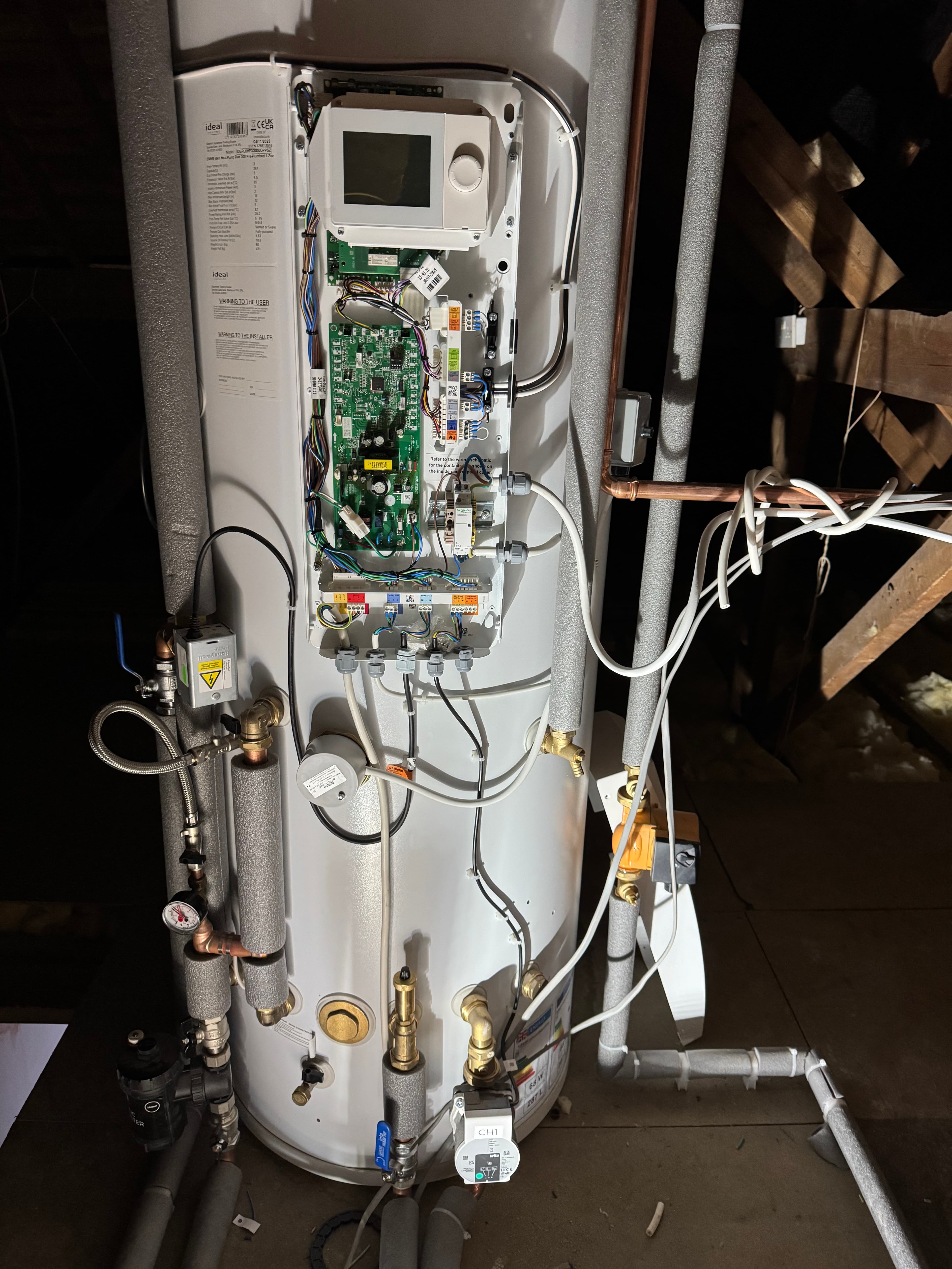 Indoor hot water cylinder with heat pump controls