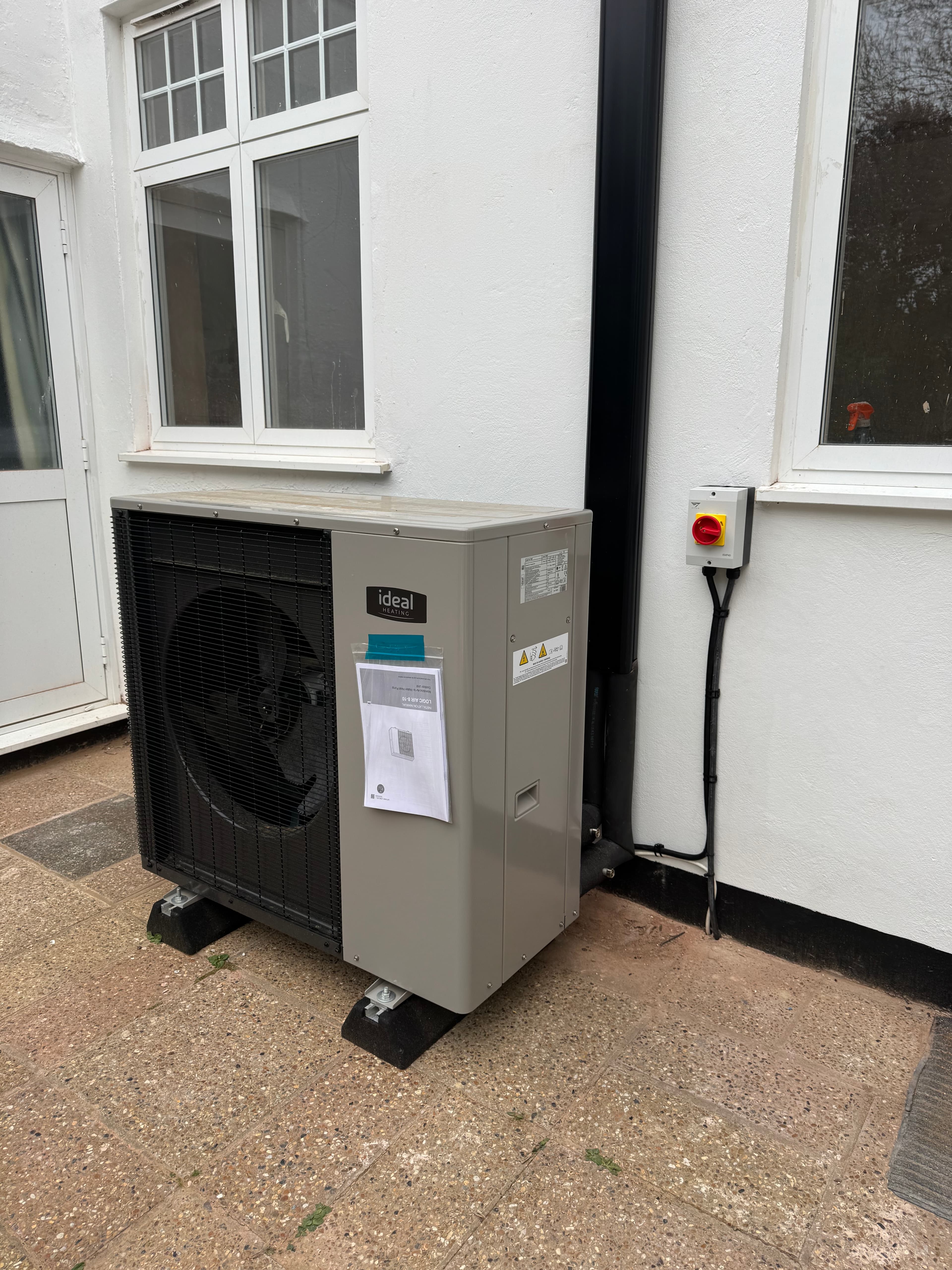 IDEAL air source heat pump installed outside a home